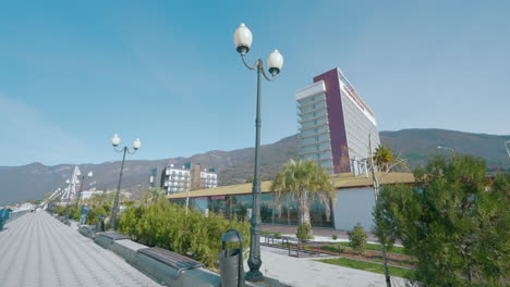 coastal city promenade with hotel and restaurant