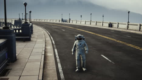 astronaut in space suit on the road bridge