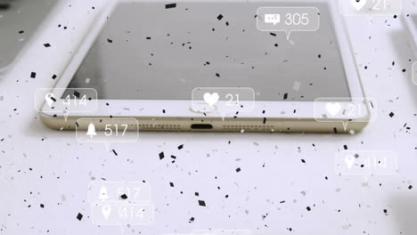 animación de iconos de las redes sociales y confeti cayendo sobre la tableta