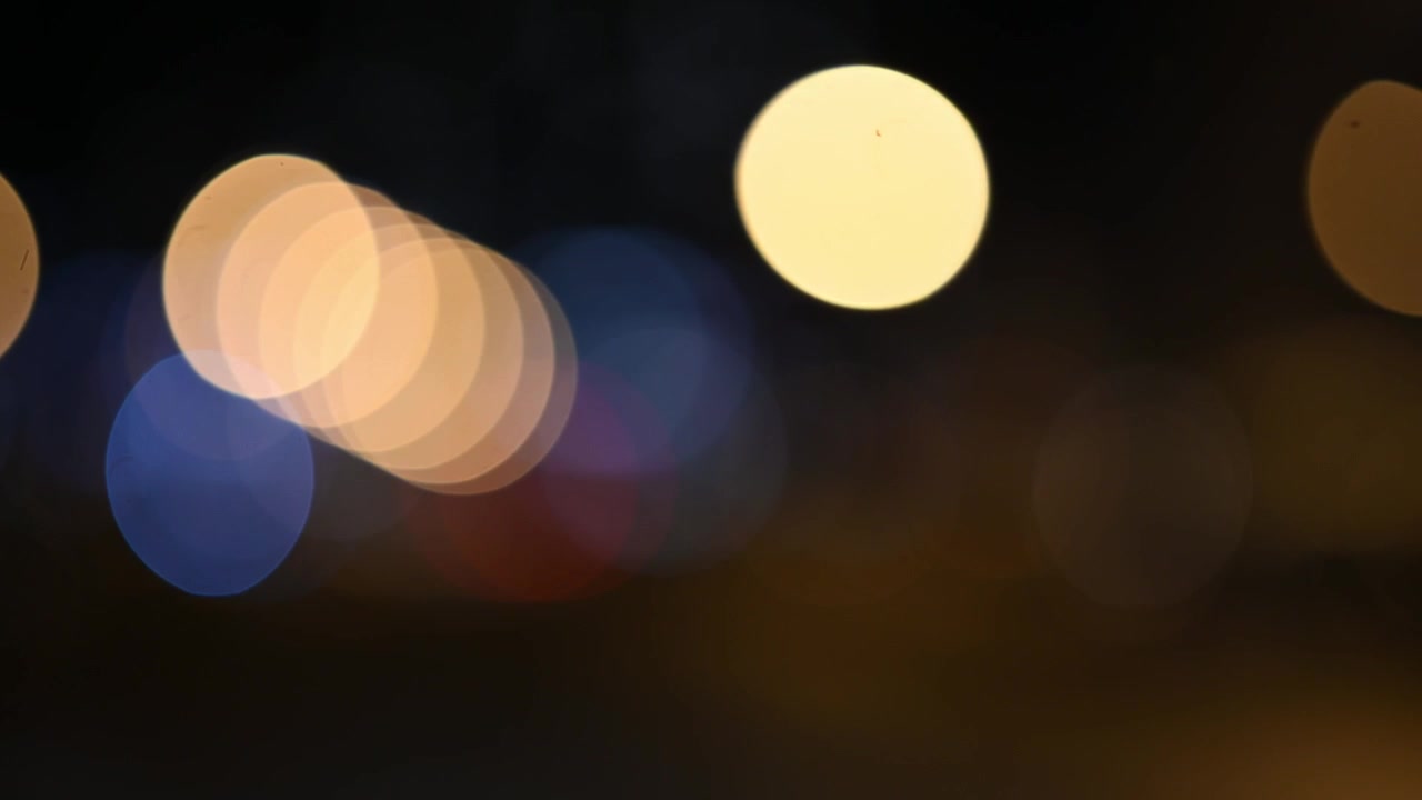 Colorful Abstract Blurred Bokeh Lights on Dark Background