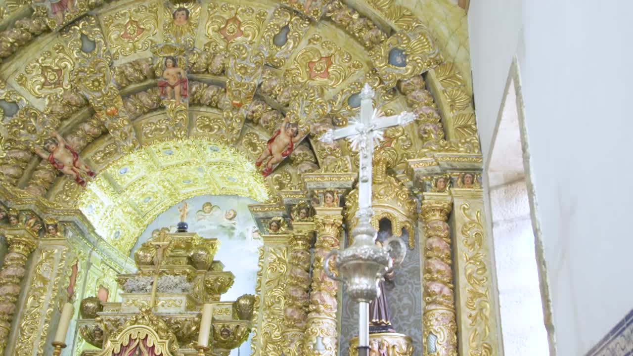 Altar church decoration golden angels crucifix in Portugal