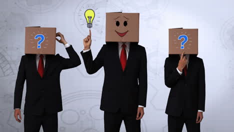 equipo de hombres de negocios escondiendo la cabeza con la caja