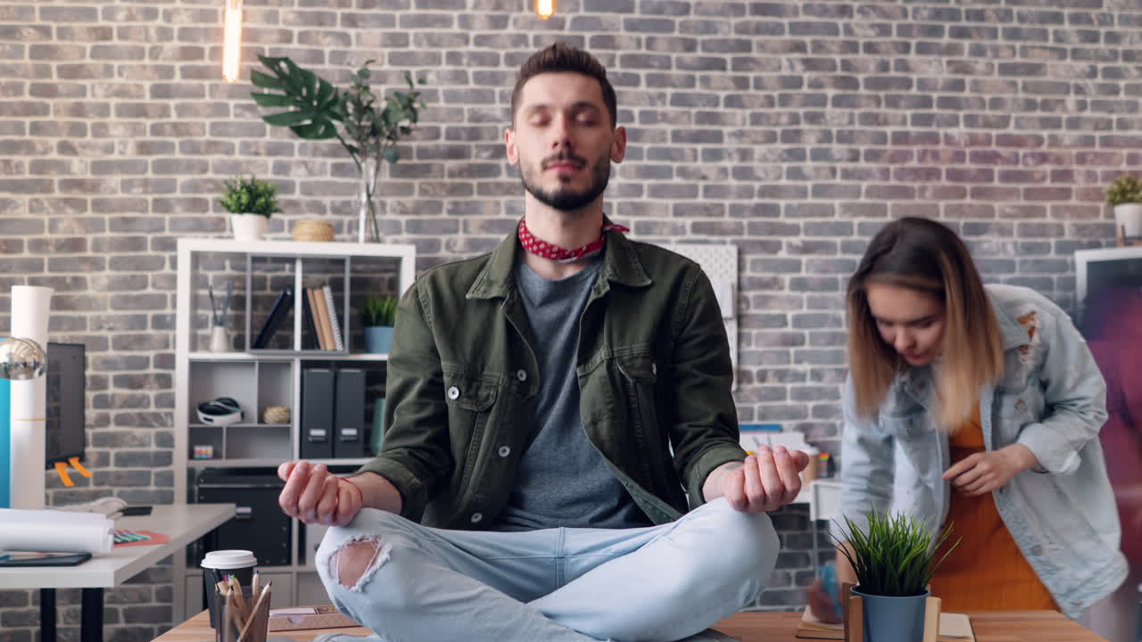 Man Meditating in Modern Office
