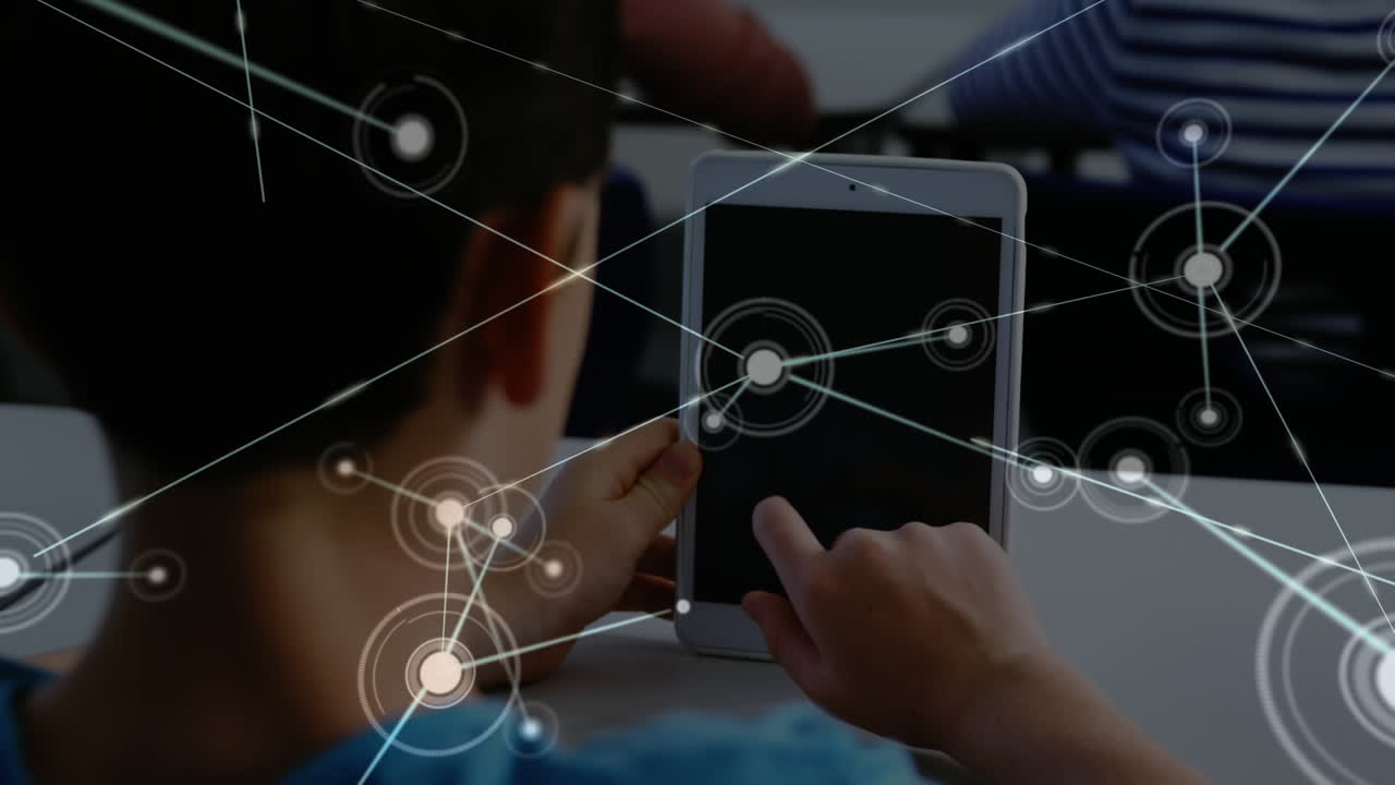 디지털 태블릿을 사용하는 소년에 대한 연결 네트워크