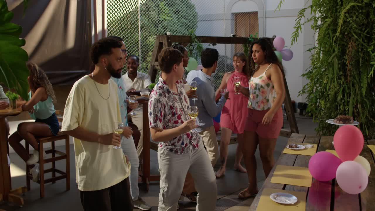 Diverse Group of Friends Toasting and Celebrating at an Outdoor Party