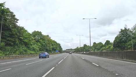 cars and trucks on a busy road