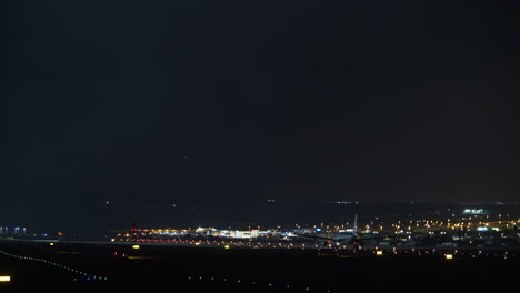 aircraft night take-off airport lights in the dark