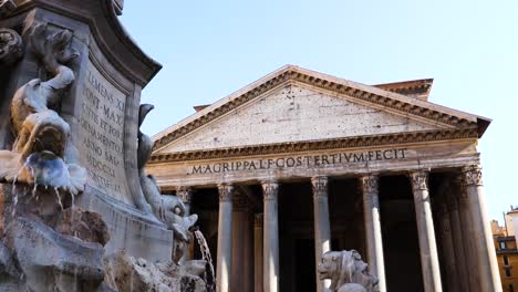 fountain of the pantheon and the pantheon in the background