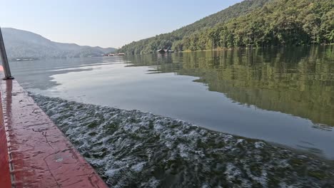 peaceful boat ride on a calm, reflective lake