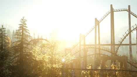 old roller coaster at sunset