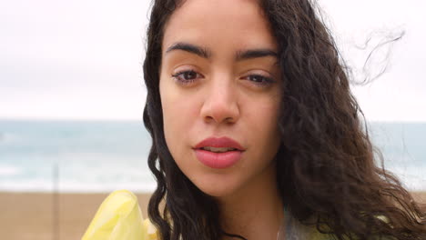 a beautiful serious young woman on holiday alone