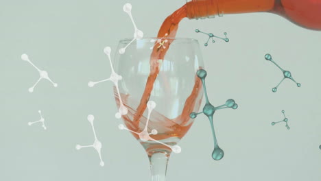 pouring wine into glass with molecular structure animation over it