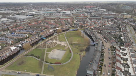 aerial of beautiful suburban neighbourhood with a large green park