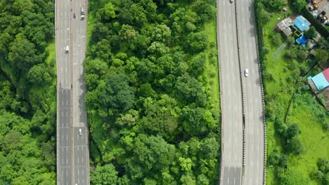 Flying-shot-over-two-parallel-roads-on-the-Pune-Mumbai-expressway-around-Khandala