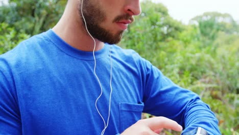 man using a smart watch