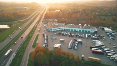 aerial shot on a logistics park with a warehouse - a loading hub