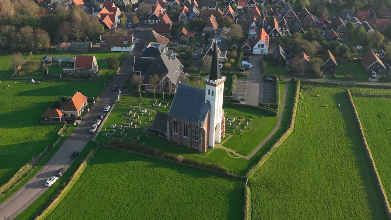 Drone video of the Little church of Den Hoorn at the Wadden island of Texel, The Netherlands.