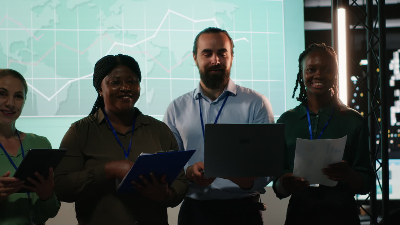 Portrait of multiethnic business team collaborating late at night