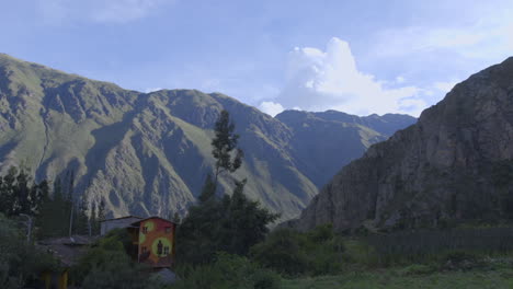 a hostel nestled in the mountains in ollantaytambo in peru's sacred valley