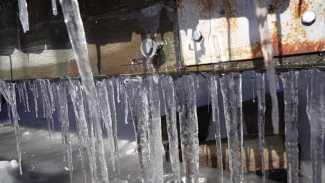 Rusty-bridge-with-ice-Stalactites-formatin