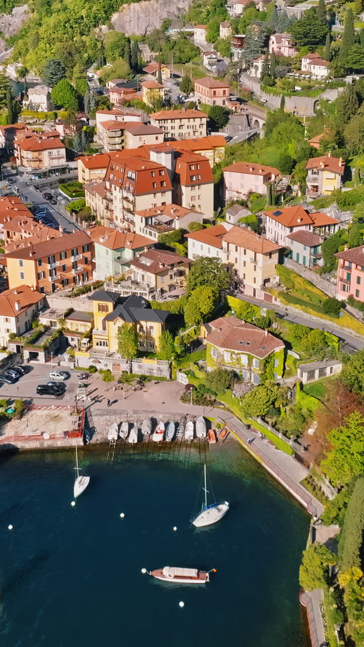 Aerial drone view of Varenna village near Lake Como, Italy. Vertical