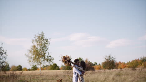 Couple-Hugging-And-Walking-On-A-Meadow-In-Summer-At-Sunset-42