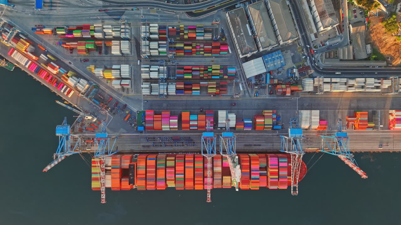 Top Down Aerial of Container Ship Unloading at Valparaiso Port export infrastructure