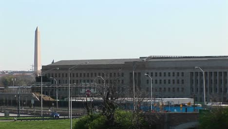 the washington monument is seen beside the pentagon