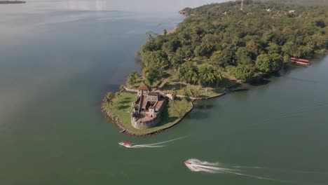 rio dulce guatemala, tourist attraction, drone shot, hispanic fortress