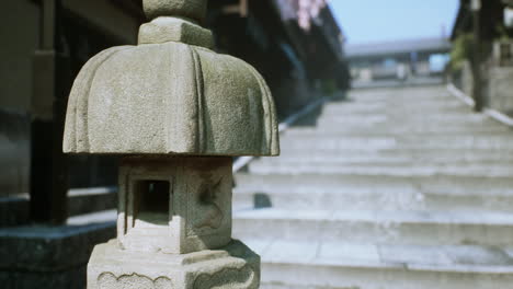 traditional japanese stone lantern on a stairway