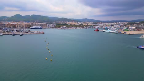 Dramatic-aerial-top-view-flight-Harbor-promenade-Ibiza-Town-Spain