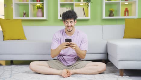 Young-man-using-phone-texting,-surfing-social-media.