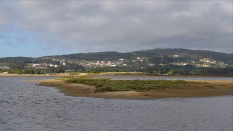 Razo-Beach-in-Galicia:-seagulls,-birds-and-Static-and-long-view-of-Estuary,-Recorded-with-Sony-RX100-in-4K