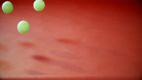 tennis ball bouncing on red floor 4k