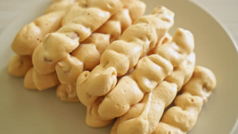 almonds-meringue-stick-on-plate---French-snack-dessert-style