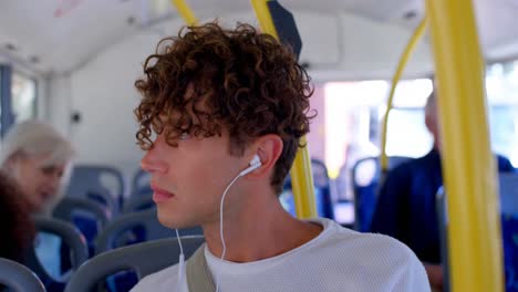 Animation-of-network-of-connections-and-numbers-over-and-schoolboy-wearing-phone-headsets