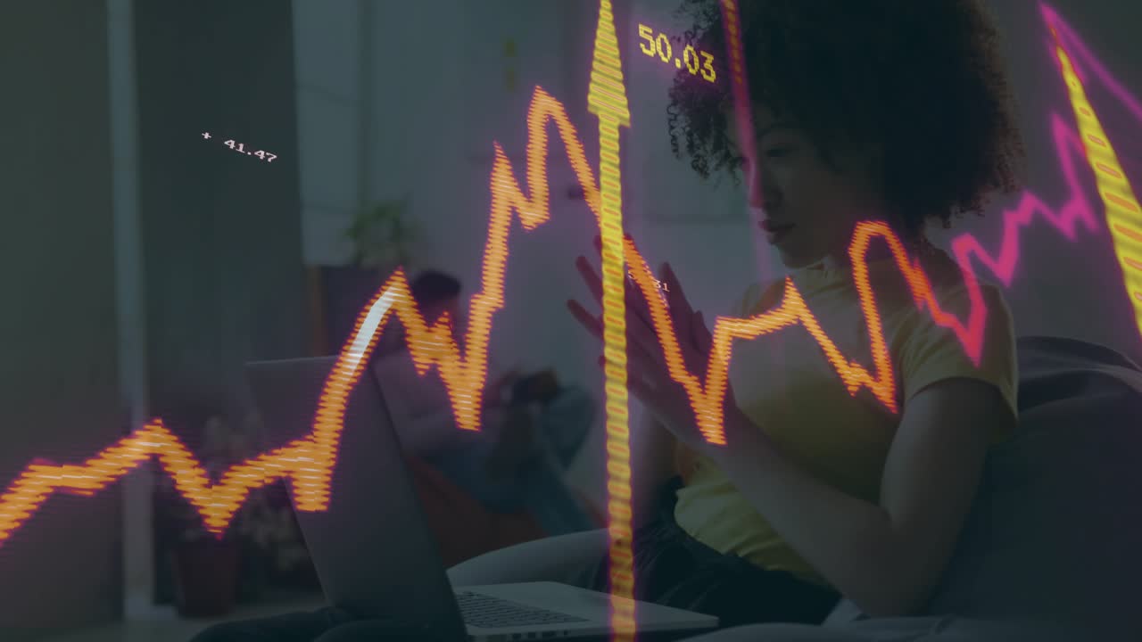 Woman on sofa typing on laptop causing finance visuals overlaying jagged line bars values deciding