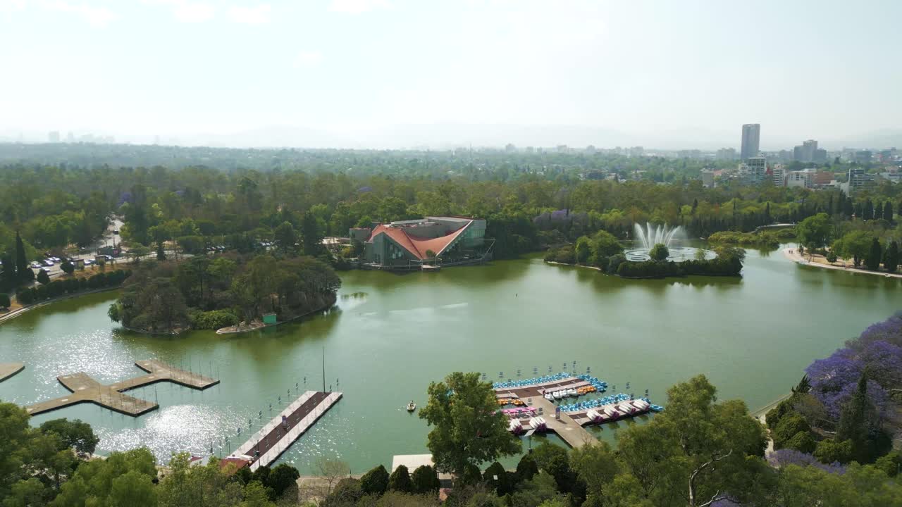 Aerial view orbit Chapultepec LAGO ALGO museum and restaurant and revealing mexico city