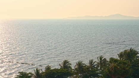 high angle of the wind blowing ocean waves toward the shore