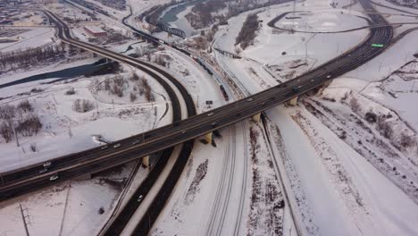 Heavy-Highway-Traffic-and-Canadian-Pacific-Train-in-Winter-Time