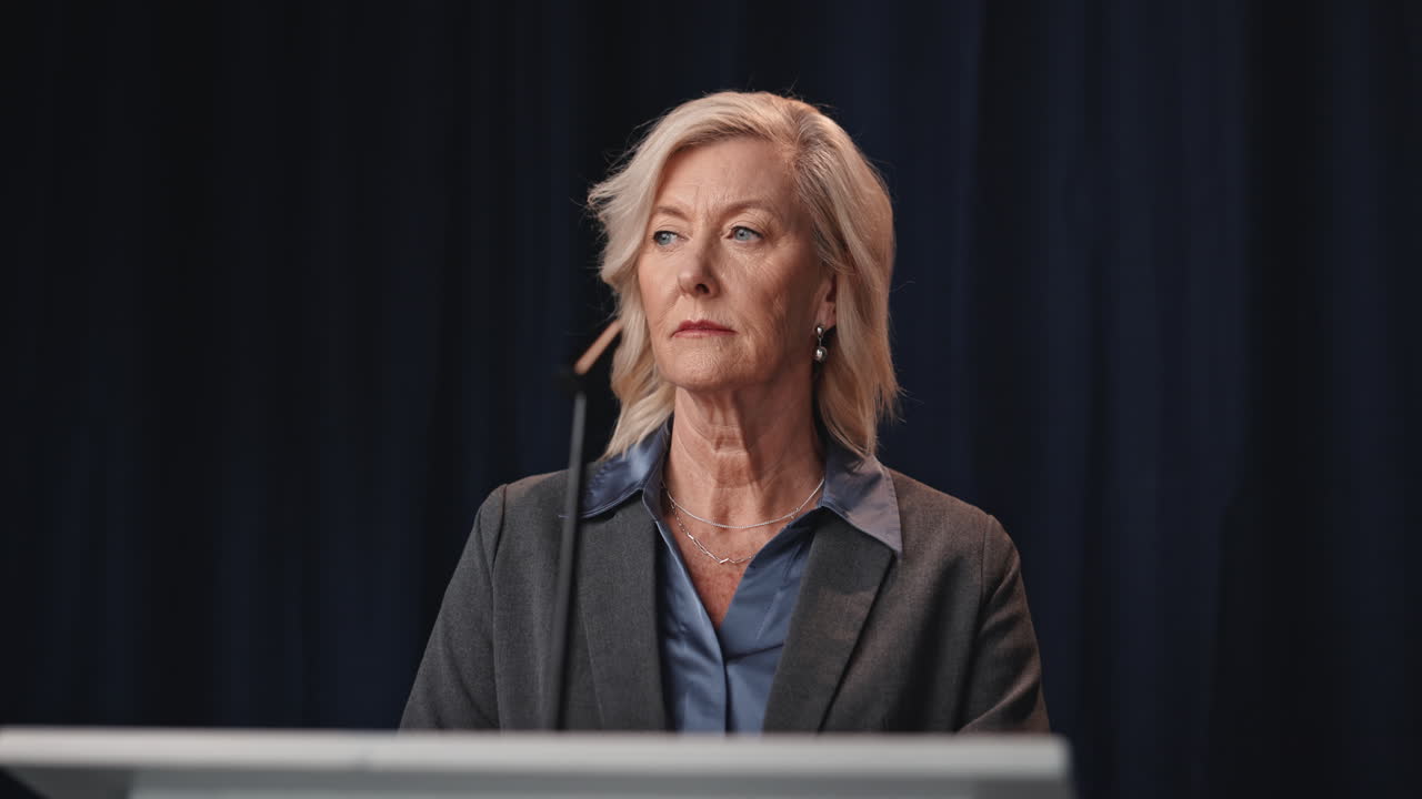 Woman speaking at a podium