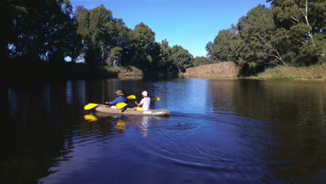 Lake,-camping-and-drone,-men-in-kayak-together