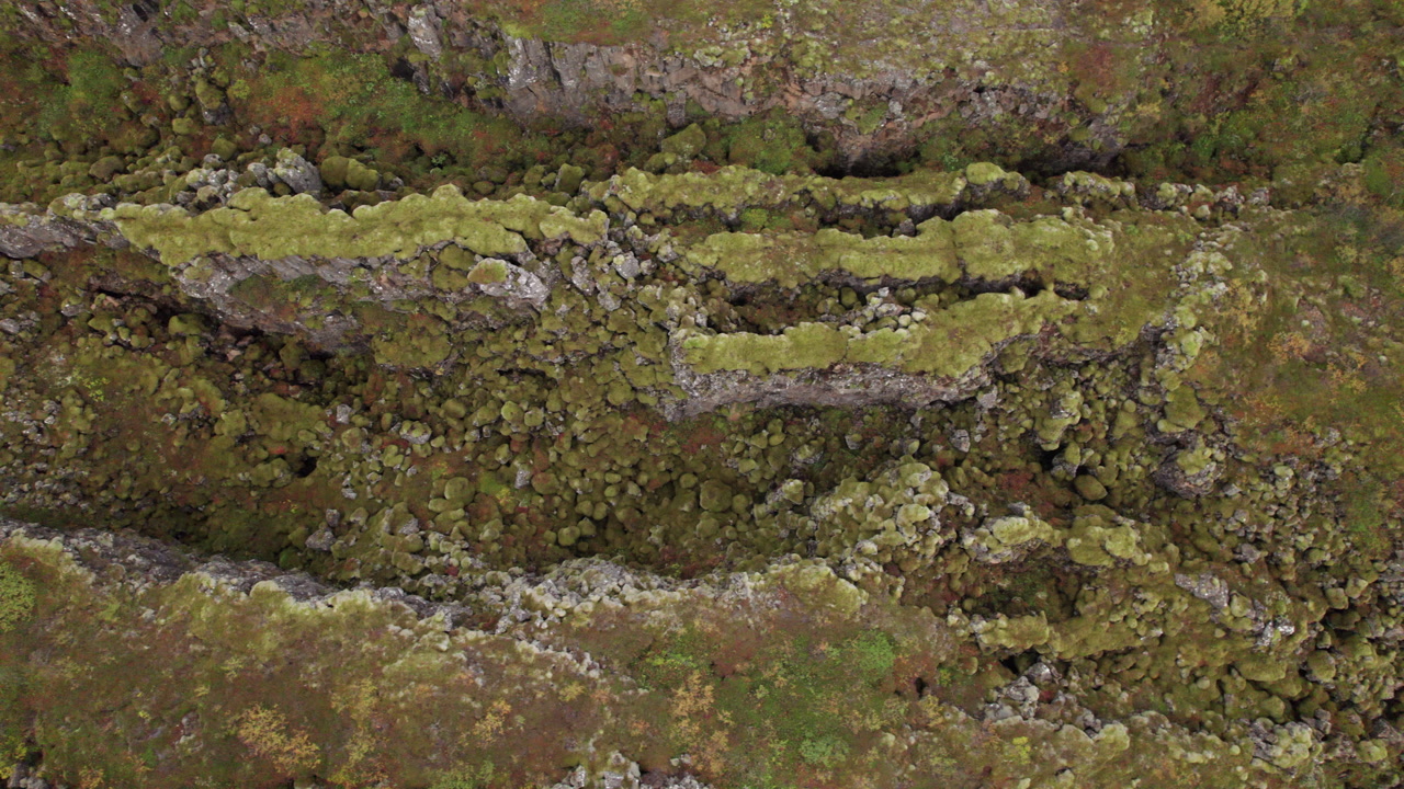 Top down dolly of Hrafnagja Basalt canyon in central Iceland, tectonic plates meeting, fault line