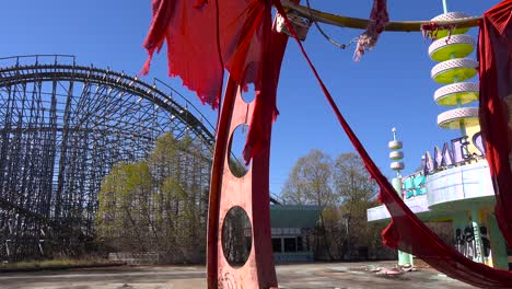 An-abandoned-and-graffiti-covered-game-center-at-an-amusement-park-presents-a-spooky-and-haunted-image