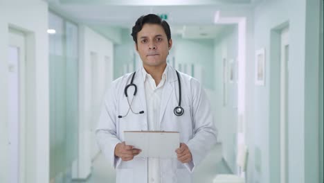 indian doctor listening to patient