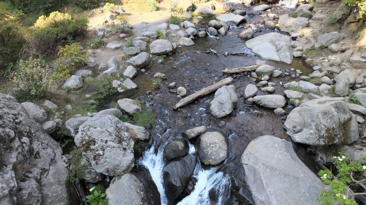 Jib tilt in small waterfall at sunrise