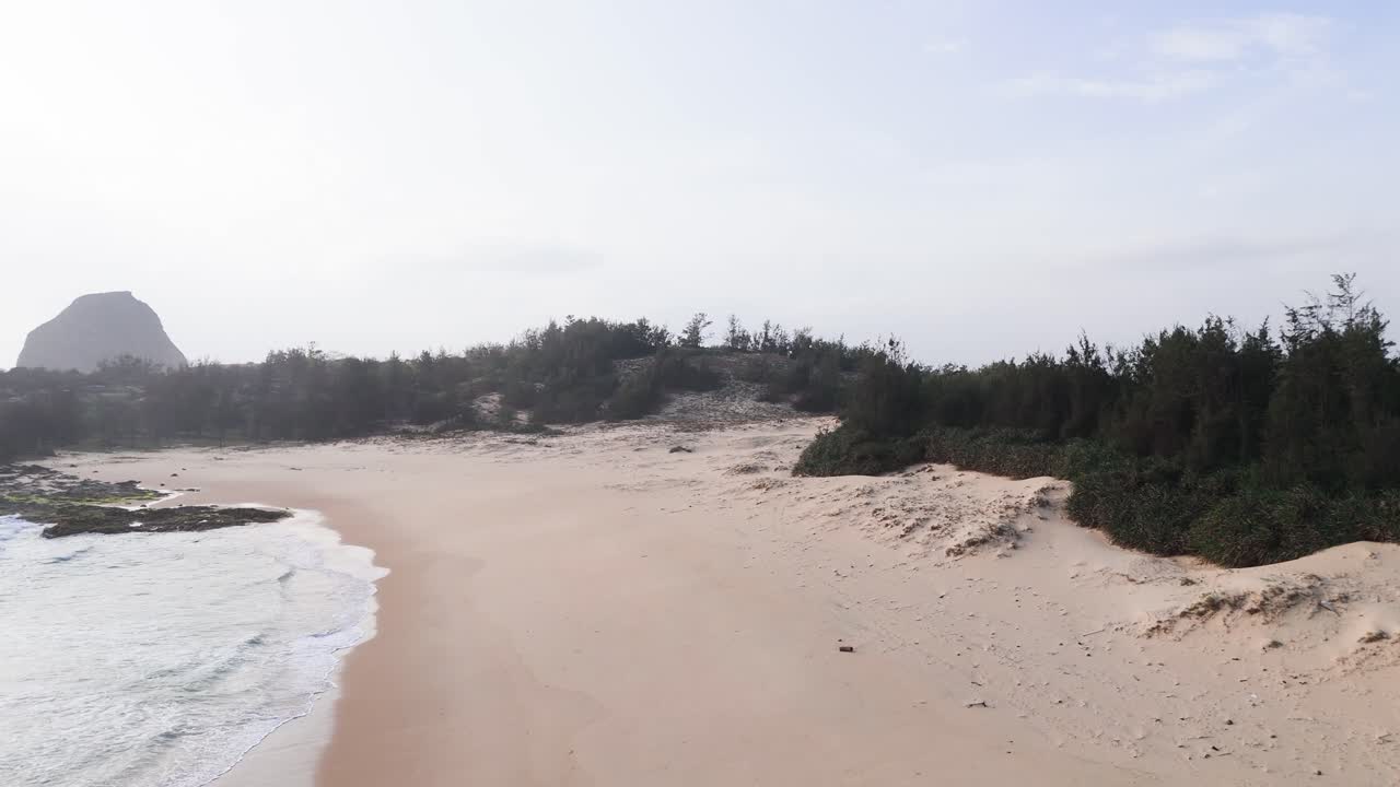 Aerial View of Bãi TắM Hòn Choi Beach and the mountain.