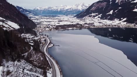 frozen zell lake in austria, alpine lake, valley view with mountains, aerial