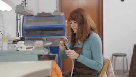 woman jewelry maker at work