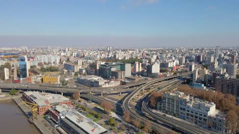 aerial view of a highway crossing through a neighborhood in buenos aires city at daytime